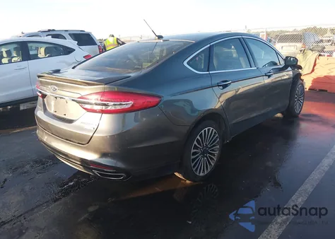2018 Ford Fusion Titanium z USA, uszkodzony, nr VIN 3FA6P0D9XJR188547